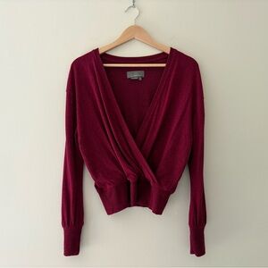 By Anthropologie burgundy/cranberry faux wrap knit top.